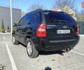 Черный Киа Sportage, объемом двигателя 1.98 л и пробегом 234 тыс. км за 8000 $, фото 4 на Automoto.ua