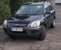 Чорний Кіа Sportage, об'ємом двигуна 2 л та пробігом 275 тис. км за 7000 $, фото 1 на Automoto.ua