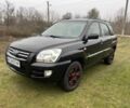 Чорний Кіа Sportage, об'ємом двигуна 2 л та пробігом 237 тис. км за 5100 $, фото 13 на Automoto.ua