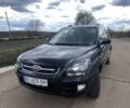 Чорний Кіа Sportage, об'ємом двигуна 2 л та пробігом 193 тис. км за 6499 $, фото 1 на Automoto.ua