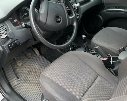 Черный Киа Sportage, объемом двигателя 1.98 л и пробегом 220 тыс. км за 7900 $, фото 12 на Automoto.ua