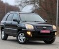 Черный Киа Sportage, объемом двигателя 2 л и пробегом 213 тыс. км за 8600 $, фото 5 на Automoto.ua