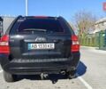 Черный Киа Sportage, объемом двигателя 1.98 л и пробегом 234 тыс. км за 8000 $, фото 3 на Automoto.ua