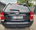 Чорний Кіа Sportage, об'ємом двигуна 2 л та пробігом 254 тис. км за 7999 $, фото 58 на Automoto.ua