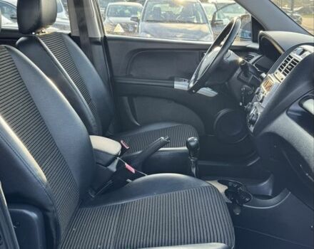 Чорний Кіа Sportage, об'ємом двигуна 2 л та пробігом 178 тис. км за 8800 $, фото 18 на Automoto.ua