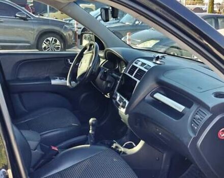 Черный Киа Sportage, объемом двигателя 1.98 л и пробегом 234 тыс. км за 8000 $, фото 12 на Automoto.ua
