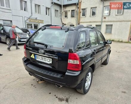 Черный Киа Sportage, объемом двигателя 2 л и пробегом 226 тыс. км за 7500 $, фото 1 на Automoto.ua