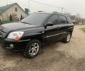 Черный Киа Sportage, объемом двигателя 2 л и пробегом 315 тыс. км за 6900 $, фото 1 на Automoto.ua