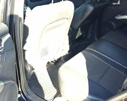 Черный Киа Sportage, объемом двигателя 1.98 л и пробегом 234 тыс. км за 8000 $, фото 16 на Automoto.ua