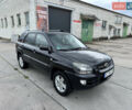 Черный Киа Sportage, объемом двигателя 2 л и пробегом 184 тыс. км за 7999 $, фото 1 на Automoto.ua