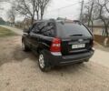 Черный Киа Sportage, объемом двигателя 2 л и пробегом 315 тыс. км за 6900 $, фото 2 на Automoto.ua
