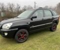 Чорний Кіа Sportage, об'ємом двигуна 2 л та пробігом 237 тис. км за 5100 $, фото 9 на Automoto.ua