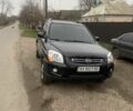 Черный Киа Sportage, объемом двигателя 2 л и пробегом 315 тыс. км за 6900 $, фото 1 на Automoto.ua