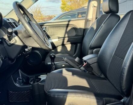 Чорний Кіа Sportage, об'ємом двигуна 2 л та пробігом 178 тис. км за 8800 $, фото 11 на Automoto.ua