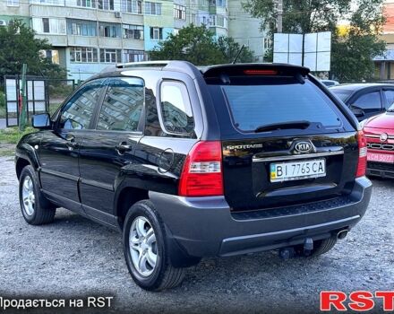 Черный Киа Sportage, объемом двигателя 2 л и пробегом 236 тыс. км за 7700 $, фото 2 на Automoto.ua