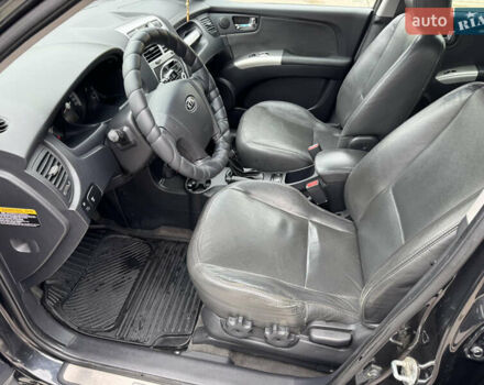 Черный Киа Sportage, объемом двигателя 2 л и пробегом 184 тыс. км за 7999 $, фото 33 на Automoto.ua