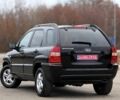 Черный Киа Sportage, объемом двигателя 2 л и пробегом 213 тыс. км за 8600 $, фото 6 на Automoto.ua