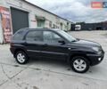 Черный Киа Sportage, объемом двигателя 2 л и пробегом 184 тыс. км за 7999 $, фото 12 на Automoto.ua