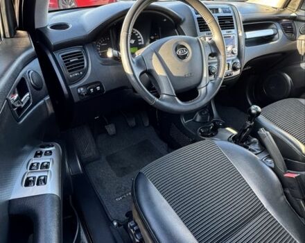 Чорний Кіа Sportage, об'ємом двигуна 2 л та пробігом 178 тис. км за 8800 $, фото 9 на Automoto.ua