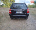 Черный Киа Sportage, объемом двигателя 2.7 л и пробегом 261 тыс. км за 8500 $, фото 3 на Automoto.ua