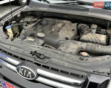 Черный Киа Sportage, объемом двигателя 2 л и пробегом 240 тыс. км за 7650 $, фото 99 на Automoto.ua