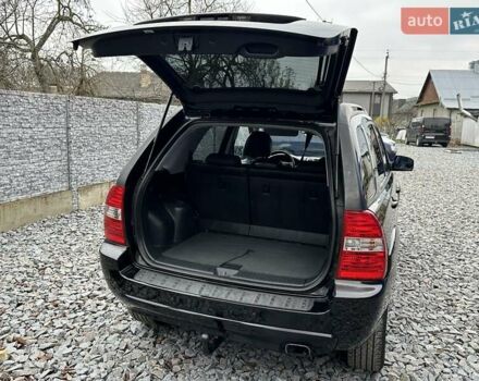 Черный Киа Sportage, объемом двигателя 2 л и пробегом 240 тыс. км за 7650 $, фото 82 на Automoto.ua