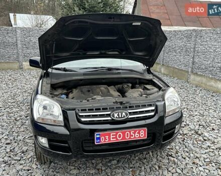 Черный Киа Sportage, объемом двигателя 2 л и пробегом 240 тыс. км за 7650 $, фото 89 на Automoto.ua