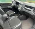 Чорний Кіа Sportage, об'ємом двигуна 2 л та пробігом 237 тис. км за 5100 $, фото 1 на Automoto.ua