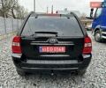 Черный Киа Sportage, объемом двигателя 2 л и пробегом 240 тыс. км за 7650 $, фото 3 на Automoto.ua