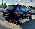 Чорний Кіа Sportage, об'ємом двигуна 2 л та пробігом 178 тис. км за 8800 $, фото 3 на Automoto.ua
