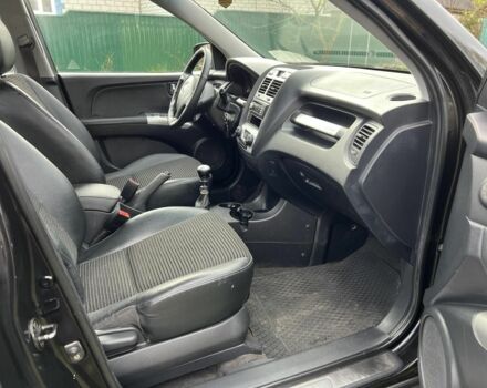 Черный Киа Sportage, объемом двигателя 2 л и пробегом 229 тыс. км за 4600 $, фото 9 на Automoto.ua