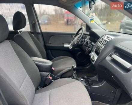 Черный Киа Sportage, объемом двигателя 1.98 л и пробегом 244 тыс. км за 8200 $, фото 7 на Automoto.ua