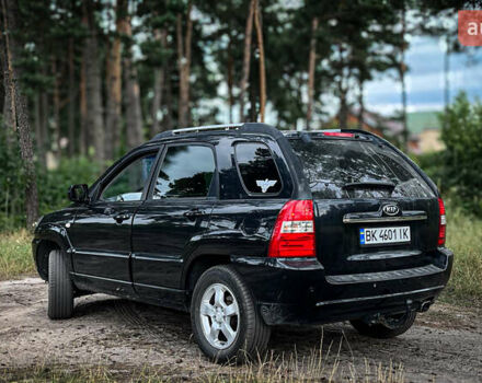 Черный Киа Sportage, объемом двигателя 1.98 л и пробегом 247 тыс. км за 7700 $, фото 7 на Automoto.ua