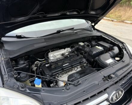 Черный Киа Sportage, объемом двигателя 2 л и пробегом 213 тыс. км за 8600 $, фото 23 на Automoto.ua
