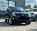 Черный Киа Sportage, объемом двигателя 2 л и пробегом 185 тыс. км за 8200 $, фото 1 на Automoto.ua