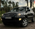 Черный Киа Sportage, объемом двигателя 1.98 л и пробегом 247 тыс. км за 7700 $, фото 1 на Automoto.ua