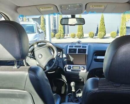 Черный Киа Sportage, объемом двигателя 1.98 л и пробегом 234 тыс. км за 8000 $, фото 19 на Automoto.ua