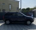 Черный Киа Sportage, объемом двигателя 2 л и пробегом 280 тыс. км за 7499 $, фото 1 на Automoto.ua