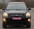 Черный Киа Sportage, объемом двигателя 2 л и пробегом 213 тыс. км за 8600 $, фото 3 на Automoto.ua