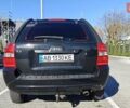 Черный Киа Sportage, объемом двигателя 1.98 л и пробегом 234 тыс. км за 8000 $, фото 6 на Automoto.ua