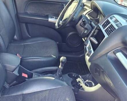 Черный Киа Sportage, объемом двигателя 1.98 л и пробегом 234 тыс. км за 8000 $, фото 13 на Automoto.ua