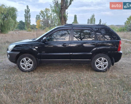 Черный Киа Sportage, объемом двигателя 2.7 л и пробегом 261 тыс. км за 8500 $, фото 2 на Automoto.ua
