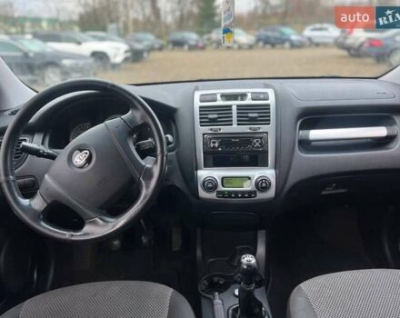 Черный Киа Sportage, объемом двигателя 1.98 л и пробегом 244 тыс. км за 8200 $, фото 8 на Automoto.ua