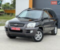 Черный Киа Sportage, объемом двигателя 2 л и пробегом 206 тыс. км за 6999 $, фото 1 на Automoto.ua