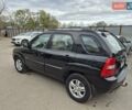 Черный Киа Sportage, объемом двигателя 2 л и пробегом 226 тыс. км за 7500 $, фото 9 на Automoto.ua
