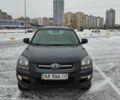 Чорний Кіа Sportage, об'ємом двигуна 2 л та пробігом 165 тис. км за 10299 $, фото 2 на Automoto.ua