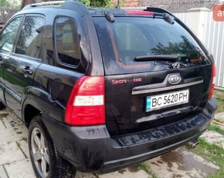 Черный Киа Sportage, объемом двигателя 2 л и пробегом 291 тыс. км за 6500 $, фото 6 на Automoto.ua