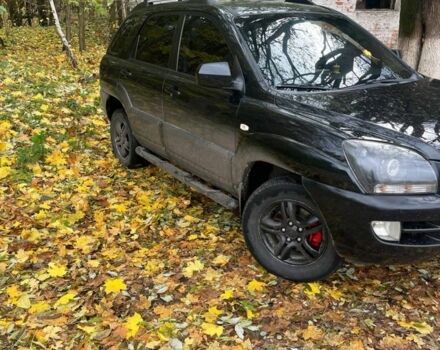 Чорний Кіа Sportage, об'ємом двигуна 2 л та пробігом 301 тис. км за 7300 $, фото 1 на Automoto.ua