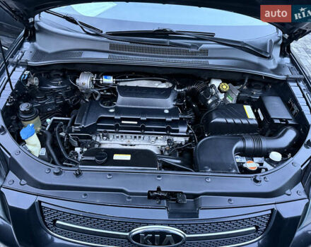 Чорний Кіа Sportage, об'ємом двигуна 2 л та пробігом 215 тис. км за 8600 $, фото 45 на Automoto.ua