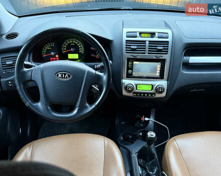 Чорний Кіа Sportage, об'ємом двигуна 2 л та пробігом 215 тис. км за 8600 $, фото 36 на Automoto.ua